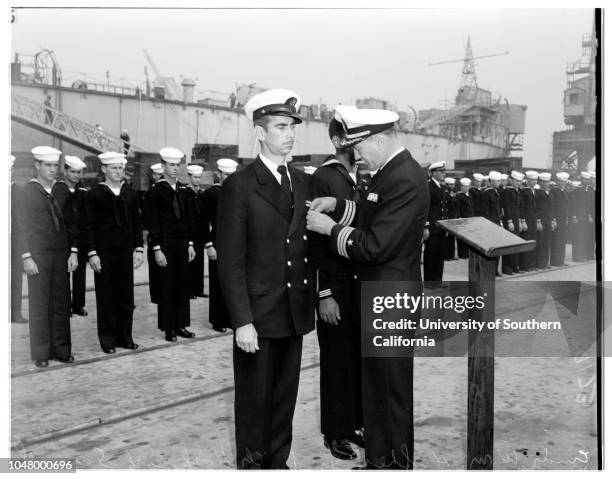 Minesweeper 'Endicott' awards, May 29, 1951. Commander William H. Shea Jr. ;Samuel Bernhardt Jr. ;Dores N Mahone .;More descriptive information with...