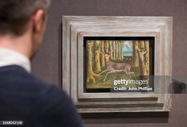 Man looks at work tilted 'The Little Deer' by Frida Kahlo during the Modern Couples: Art, Intimacy and the Avant-garde press view at the Barbican Art...