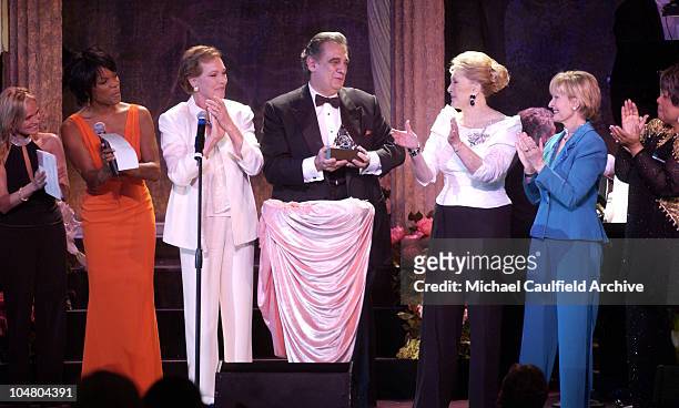 Kristin Chenoweth, Nnenna Freelon, Julie Andrews, Ginny Mancini and Florence Henderson applaud as Placido Domingo accepts his ELLA award.