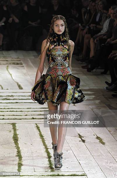 Model presents a creation by British designer Sarah Burton for Alexander McQueen during the Spring/Summer 2011 ready-to-wear collection show on...