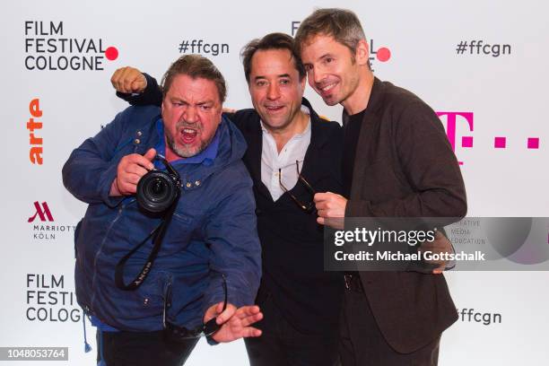 Director Philipp Kadelbach and actors Jan Josef Liefers and Armin Rohde attend the premiere for the film 'So viel Zeit' at Filmpalast Cologne on...