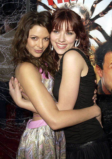 Kari Wuhrer and Scarlett Johansson during "Eight Legged Freaks" World Premiere at Mann's Chinese Theater in Hollywood, California, United States.