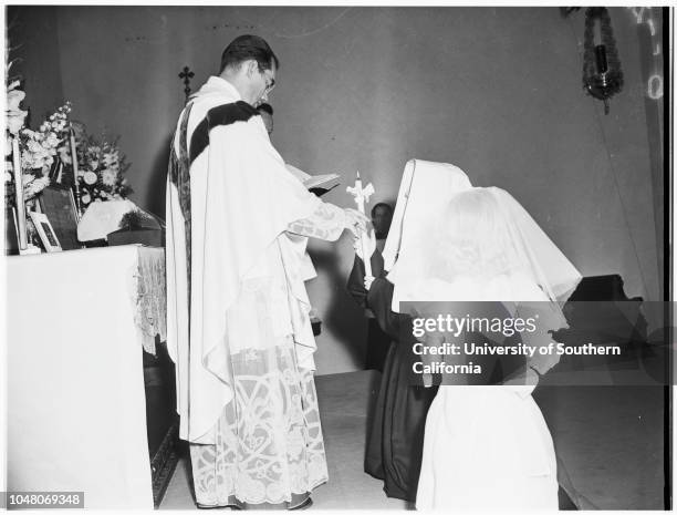 Novice nuns, 18 August 1951. Margaret Mulrooney ;Juanita Quigley ;Evelyn Schwalenberg ;Ann Ryan -- 7 years;Bishop Timothy Manning;Judy...