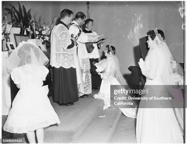 Novice nuns, 18 August 1951. Margaret Mulrooney ;Juanita Quigley ;Evelyn Schwalenberg ;Ann Ryan -- 7 years;Bishop Timothy Manning;Judy...