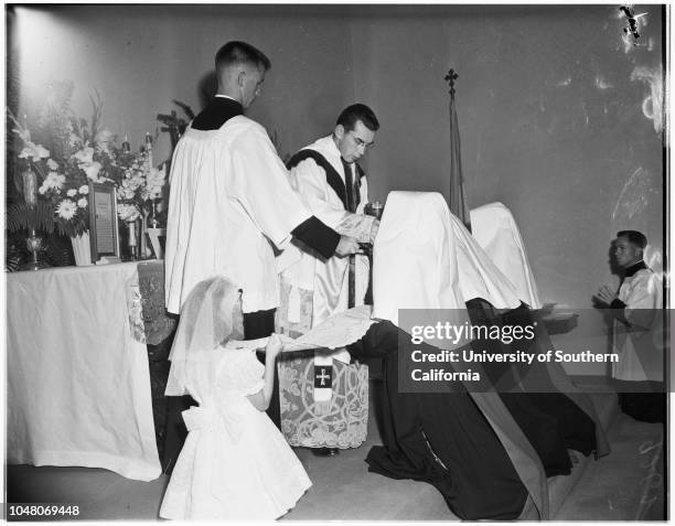 Novice nuns, 18 August 1951. Margaret Mulrooney ;Juanita Quigley ;Evelyn Schwalenberg ;Ann Ryan -- 7 years;Bishop Timothy Manning;Judy...