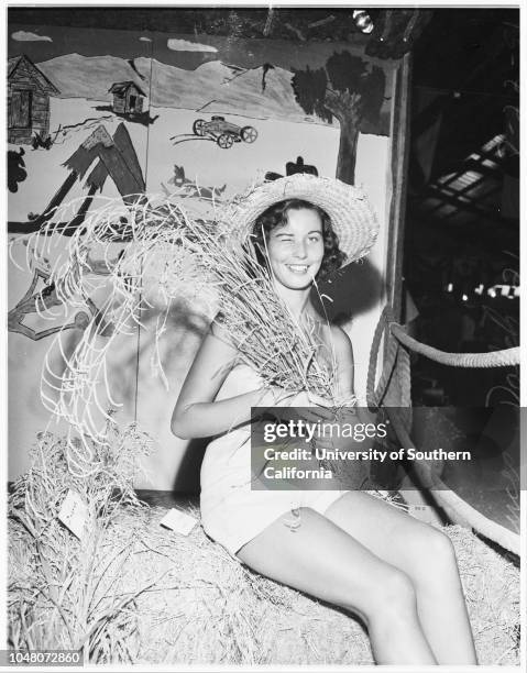 San Bernardino County Fair, 22 August 1951. Frances Dolch -- 21 years;Ronald Haas -- 23 years;Arthue D McCain;Ed Vose.;Caption slip reads:...