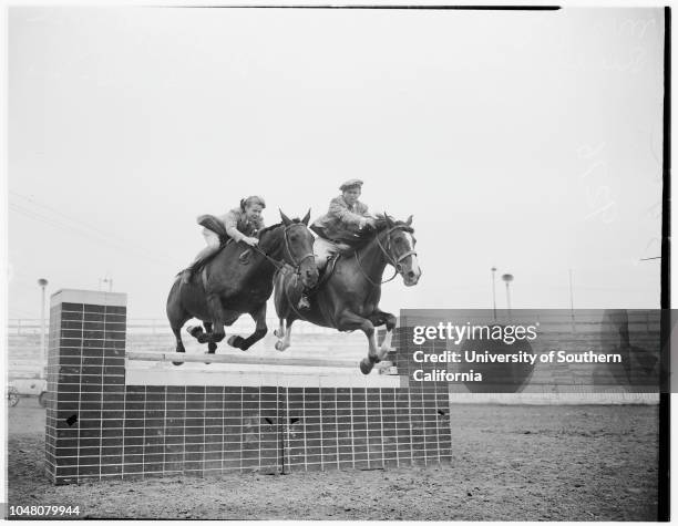 National Horseshow, 26 May 1949. Rudy Smithers;J.J Kessler ;Horse with blinkers is 'Rex Qui Saleet');Other horse is 'Hop-A-Long'.;Caption slip reads:...