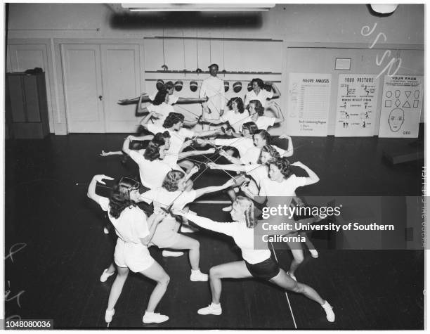 Fencing class at Caroline Leonetti's, 22 October 1948. Aldo Nadi, Master.;5Caption slip reads: 'Photographer: Jensen. Assignment: Caroline Leonetti...