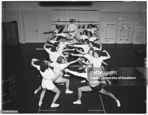 Fencing class at Caroline Leonetti's, 22 October 1948. Aldo Nadi, Master.;5Caption slip reads: 'Photographer: Jensen. Assignment: Caroline Leonetti...