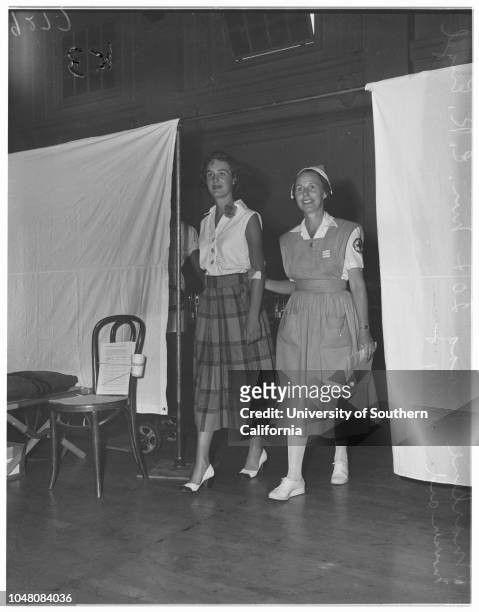 Models at Blood Bank located at Pasadena Elk's Club, 30 August 1951. Marlene Maag -- 20 years ;Mrs E.R Engel .;Caption slip reads: 'Photographer:...