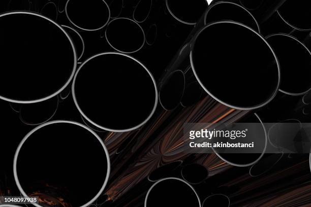 stack of shiny metal steel pipes with flame - cylinder stock pictures, royalty-free photos & images