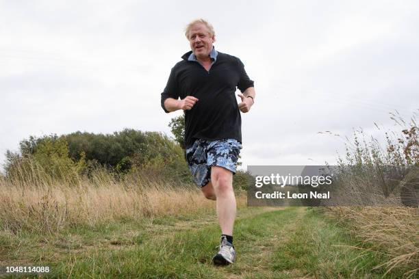 Boris Johnson runs near his home on October 2, 2018 in Thame, England. The former Foreign Secretary is due to talk at a fringe event at the 2018...