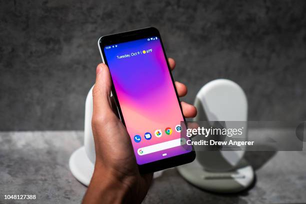 Guest holds the new Google Pixel 3 XL smartphone during a Google product release event, October 9, 2018 in New York City. The phones will go on sale...