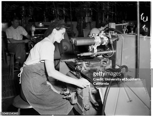 Rosie the Riveter' North American Aircraft, 26 October 1951. Mrs Beatrice Woltkamp -- 32 years;Mrs Marjorie Weaver -- 25 years;Joyce Oliver -- 23...