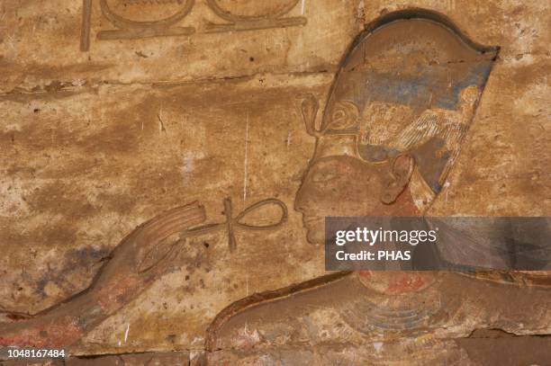 Egypt. Abydos. Temple of Seti I. New Kingdom. 19th Dynasty. Relief with original polychrome, depicting The Pharaoh wearing the Blue Crown receiving...