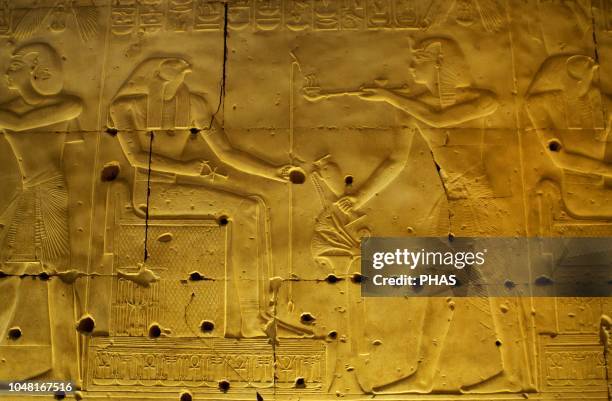 Egypt. Abydos. Temple of Seti I. New Kingdom. 19th Dynasty. The Pharaoh Seti I making offerings of incense to the god Horus. 1292-1189 BC.