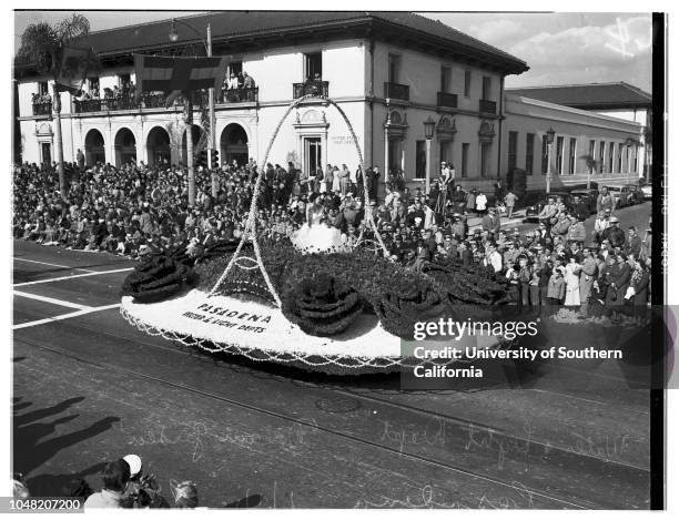 Tournament of Roses floats, 01 January 1952. Long Beach 'Miss Universe' Closeup of Joe Brown and Maribel Arrieta;Monterey Park 'Cabrillo's Discovery...