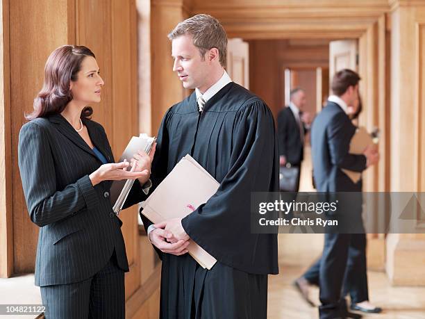 judge and lawyer talking in corridor - courthouse bildbanksfoton och bilder