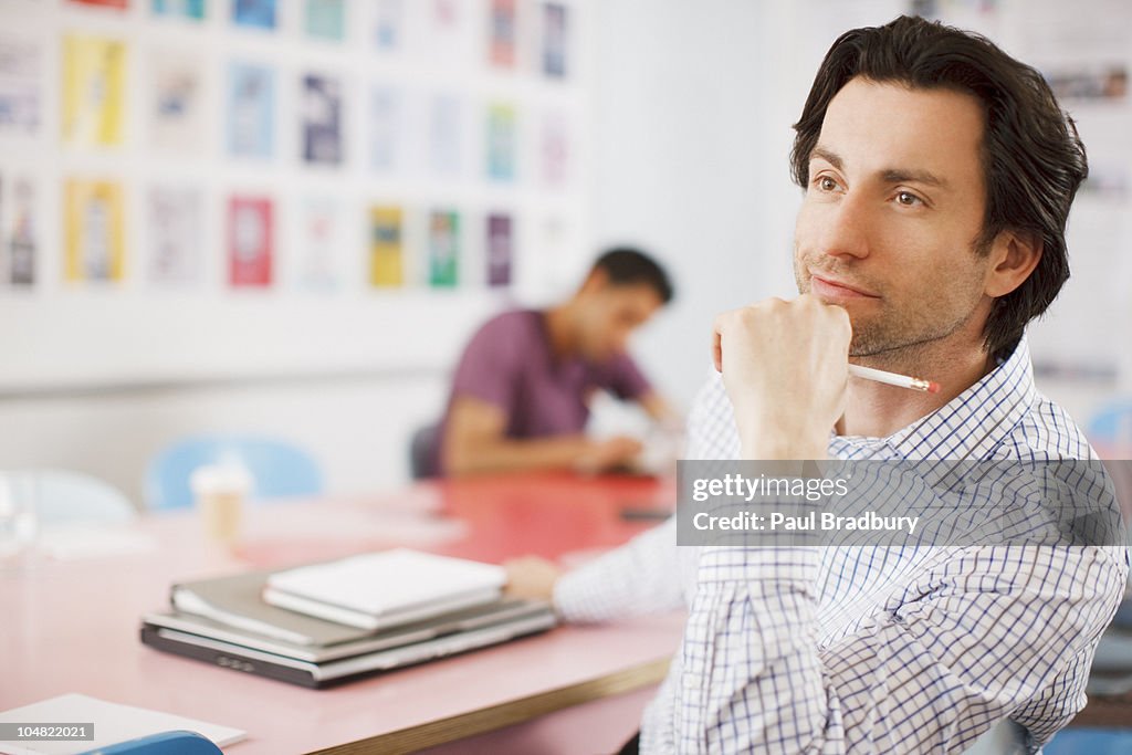 Pensive businessman in office