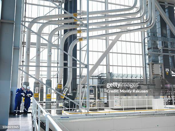 engineers in charging hall - nuclear power station stock pictures, royalty-free photos & images