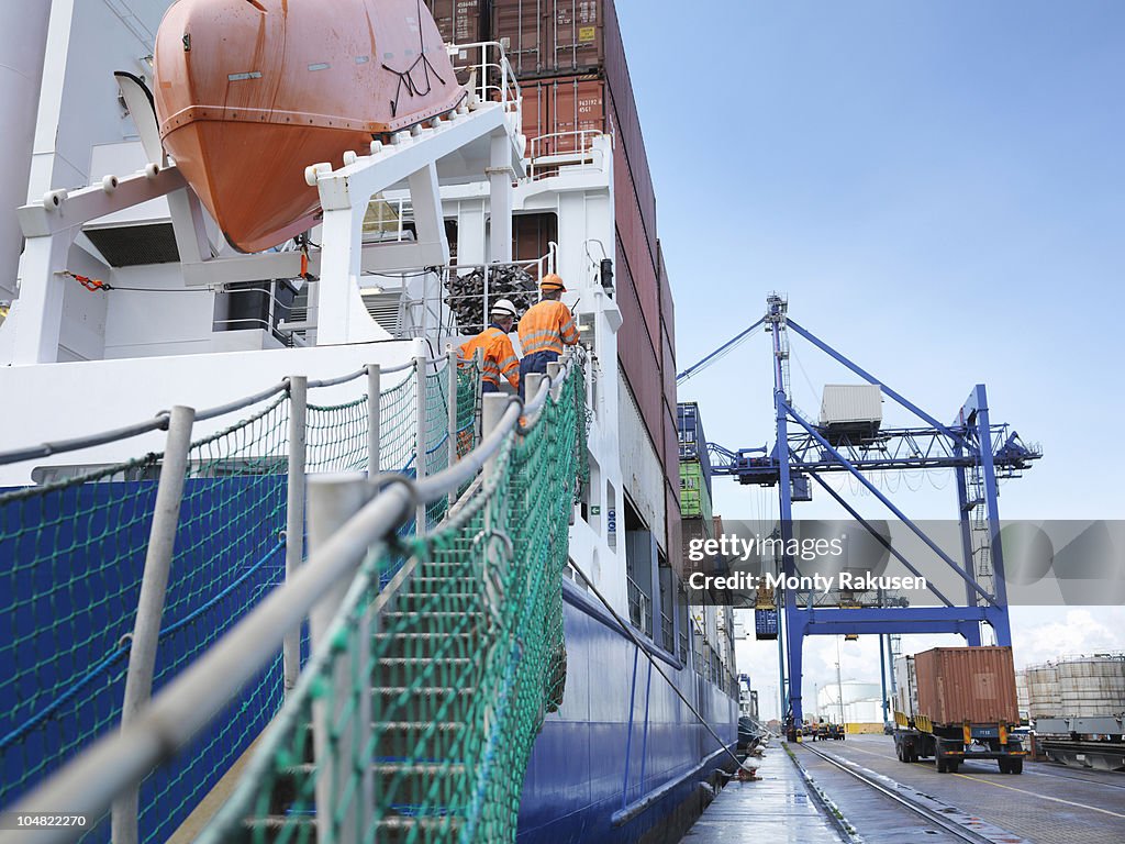 People Loading Ships Sailors Watching Container Ship Loading High-Res Stock Photo - Getty Images