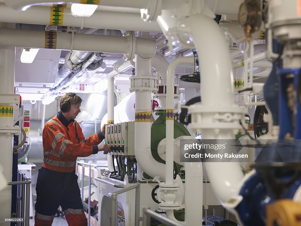 Engineer in ship's engine room
