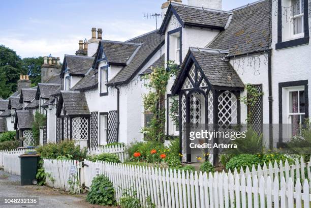 Row of white houses in the village Kenmore, Perth and Kinross, Perthshire in the Highlands of Scotland, UK.