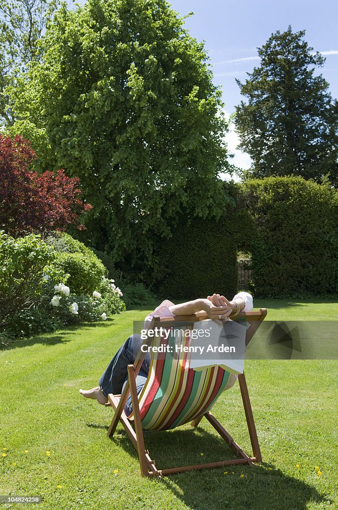 Woman relaxing deck chair