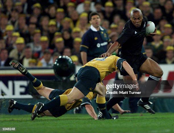 Jonah Lomu of New Zealand makes a break during the match between Australia v New Zealand for the Bledisloe Cup at Stadium Australia, Sydney...