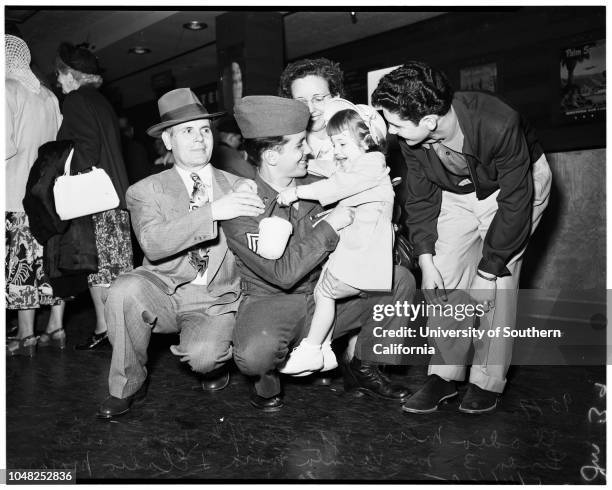 Some of Fortieth returning from Korea, via Seattle, 4 April 1952. Sergeant Russell Kiernan;Mary Jane Kiernan;Russell Kiernan, Junior;Corporal Thomas...