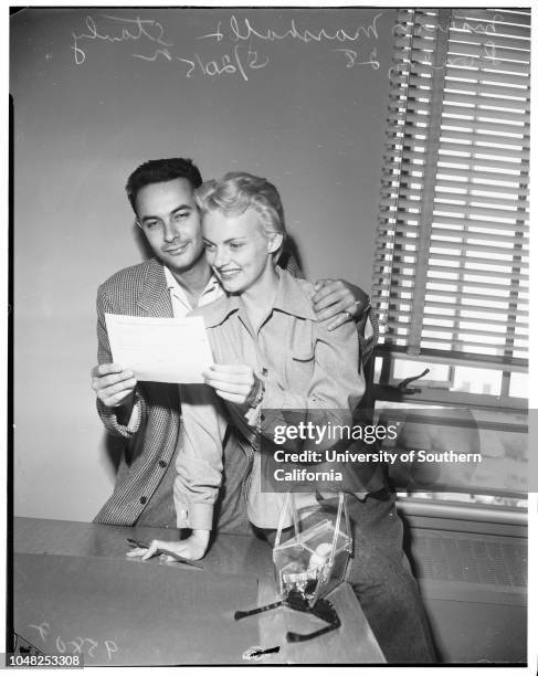 Marion Marshall gets wedding license, 20 May 1952. Actress Marion Marshall;Stanley Donen -- 28 years .;Caption slip reads: 'Photographer: Gaze. Date:...