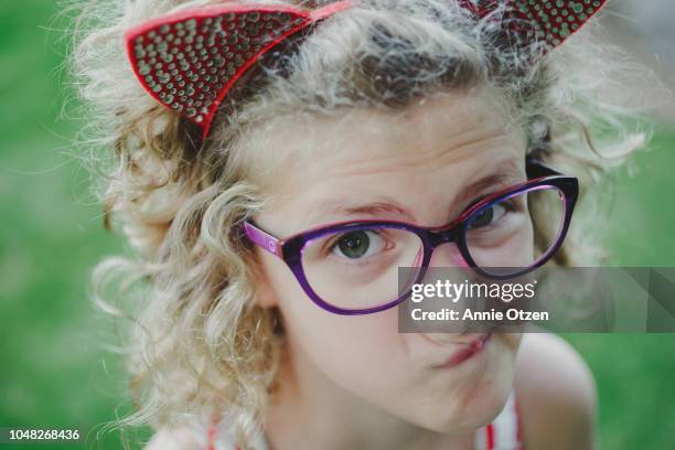 silly girl making a face - smirking stock pictures, royalty-free photos & images