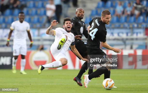 Alejandro Pozuelo and Lasse Nielsen fight for the ball during the UEFA Europa League Group I match between KRC Genk and Malmo at Cristal Arena on...