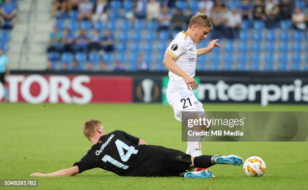 Anders Christiansen and Jere Uronen fight for the ball during the UEFA Europa League Group I match between KRC Genk and Malmo at Cristal Arena on...