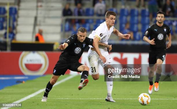 Arnor Ingvi Traustason and Joakim Maehle fight for the ball during the UEFA Europa League Group I match between KRC Genk and Malmo at Cristal Arena...