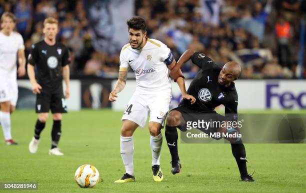 Alejandro Pozuelo and Fouad Bachirou fight for the ball during the UEFA Europa League Group I match between KRC Genk and Malmo at Cristal Arena on...