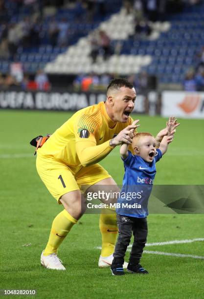 Daniel Vukovic celebrates with his son after winning the UEFA Europa League Group I match between KRC Genk and Malmo at Cristal Arena on September...