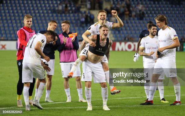 Genk's players celebrate after winning the UEFA Europa League Group I match between KRC Genk and Malmo at Cristal Arena on September 20, 2018 in...