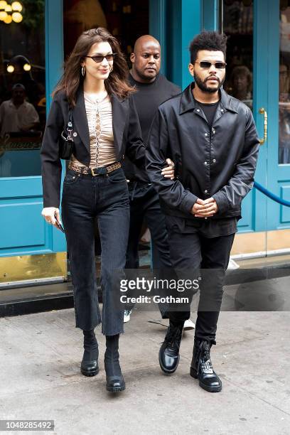 Bella Hadid and The Weeknd are seen in SoHo on October 9, 2018 in New York City.