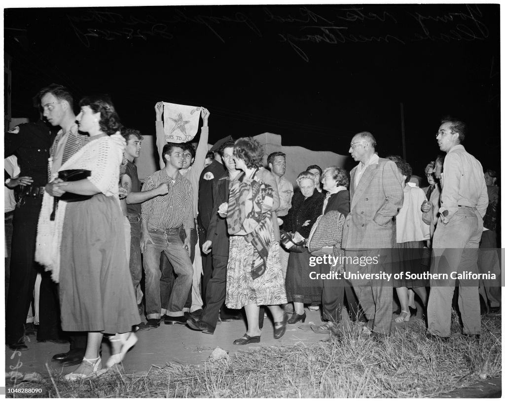 Progressive Party meeting in Culver City at which Young Korean War Veterans protest communist influence and attendance, 1952