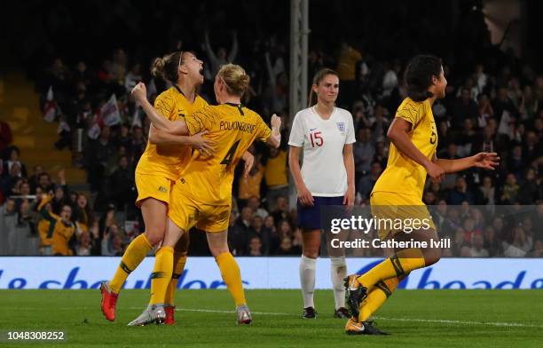 Clare Polkinghorne of Australia celebrates after she scores her sides first goal during the International Friendly between England Women and...