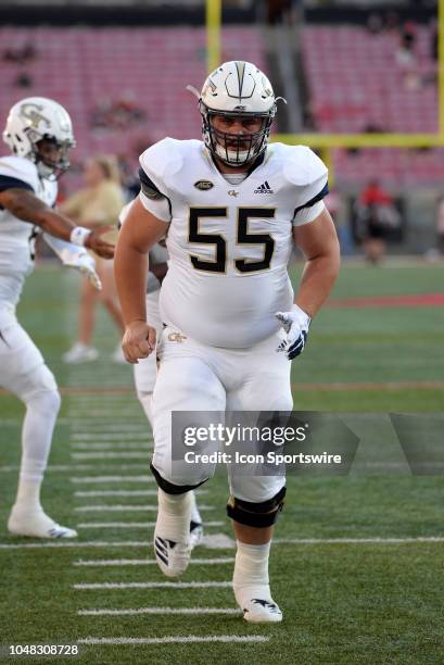 Georgia Tech Yellow Jackets offensive lineman Kenny Cooper warms up for the ACC Conference college football game between the Georgia Tech Yellow...