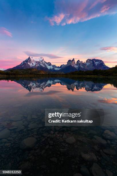 sunrise in the patagonian andes mountains, torres del paine, patagonia. - puerto natales stock pictures, royalty-free photos & images