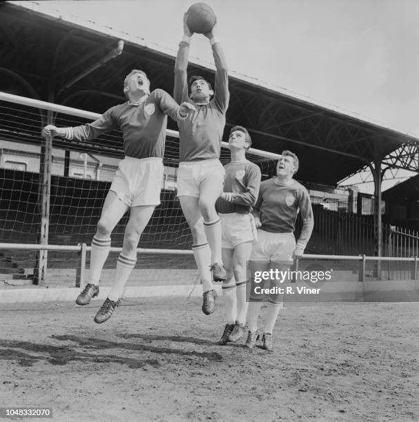 From left, John Sjoberg, Gordon Banks, Richie Norman and Ian King of Leicester City Football Club team squad practice together on the pitch at...