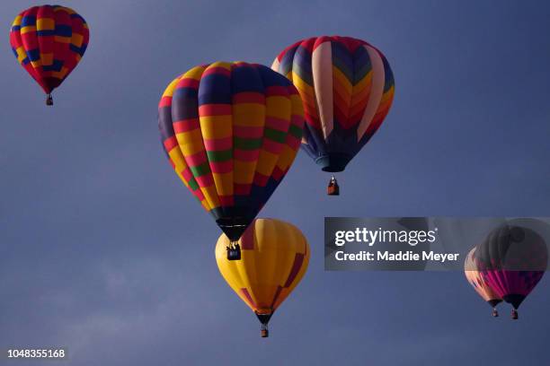 Balloons take off from Balloon Fiesta park during the 2018 Albuquerque International Balloon Fiesta on October 9, 2018 in Albuquerque, New Mexico....