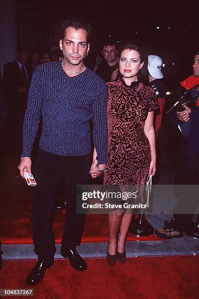 Richard Grieco & Yasmine Bleeth during Grand Opening of Tommy Hilfiger Beverly Hills Store at Tommy Hilfinger Store in Beverly Hills, California,...