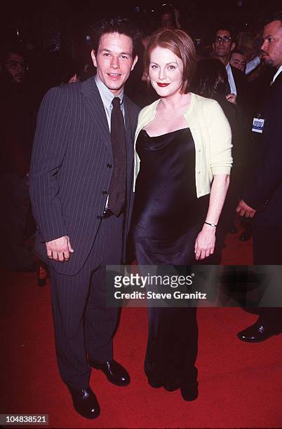 Mark Wahlberg & Julianne Moore during "Boogie Nights" Los Angeles Premiere at Mann Chinese Theatre in Hollywood, California, United States.