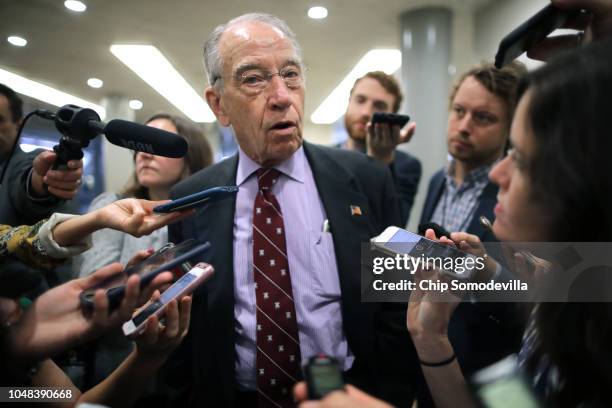 Senate Judiciary Committee Chairman Chuck Grassley talks with reporters as he heads for a meeting at the U.S. Capitol October 02, 2018 in Washington,...