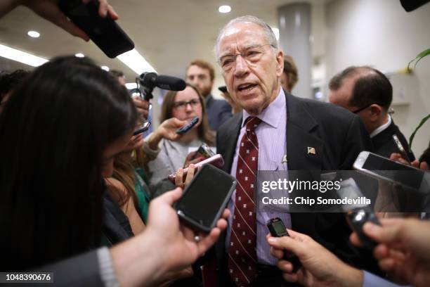 Senate Judiciary Committee Chairman Chuck Grassley talks with reporters as he heads for a meeting at the U.S. Capitol October 02, 2018 in Washington,...