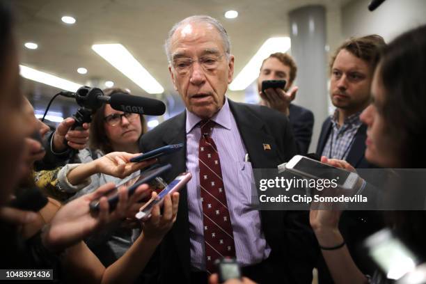 Senate Judiciary Committee Chairman Chuck Grassley talks with reporters as he heads for a meeting at the U.S. Capitol October 02, 2018 in Washington,...